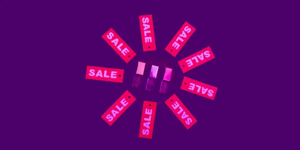Nine sale signs are arranged in a concentric manner around three USB sticks.