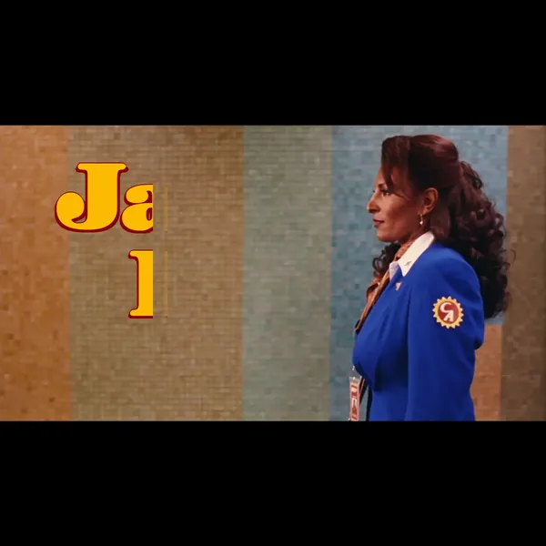 The title text 'Jackie Brown' is semi-revealed, truncated at 50% of the length of the words. The background show the character dressed in an airline uniform against a mosiac tiled wall.